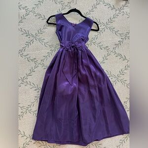 Girls deep purple taffeta dress with bow belt. Girls Size 12